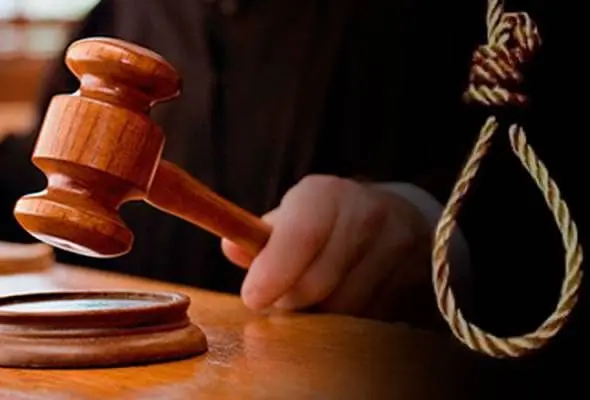 Judge holding a gavel.