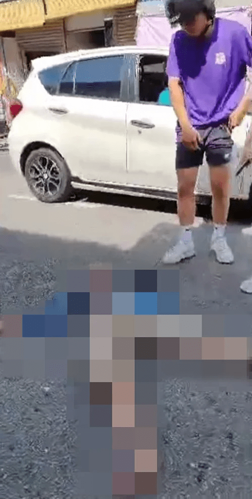 17yo motorcyclist looks at the body of Chen's mother