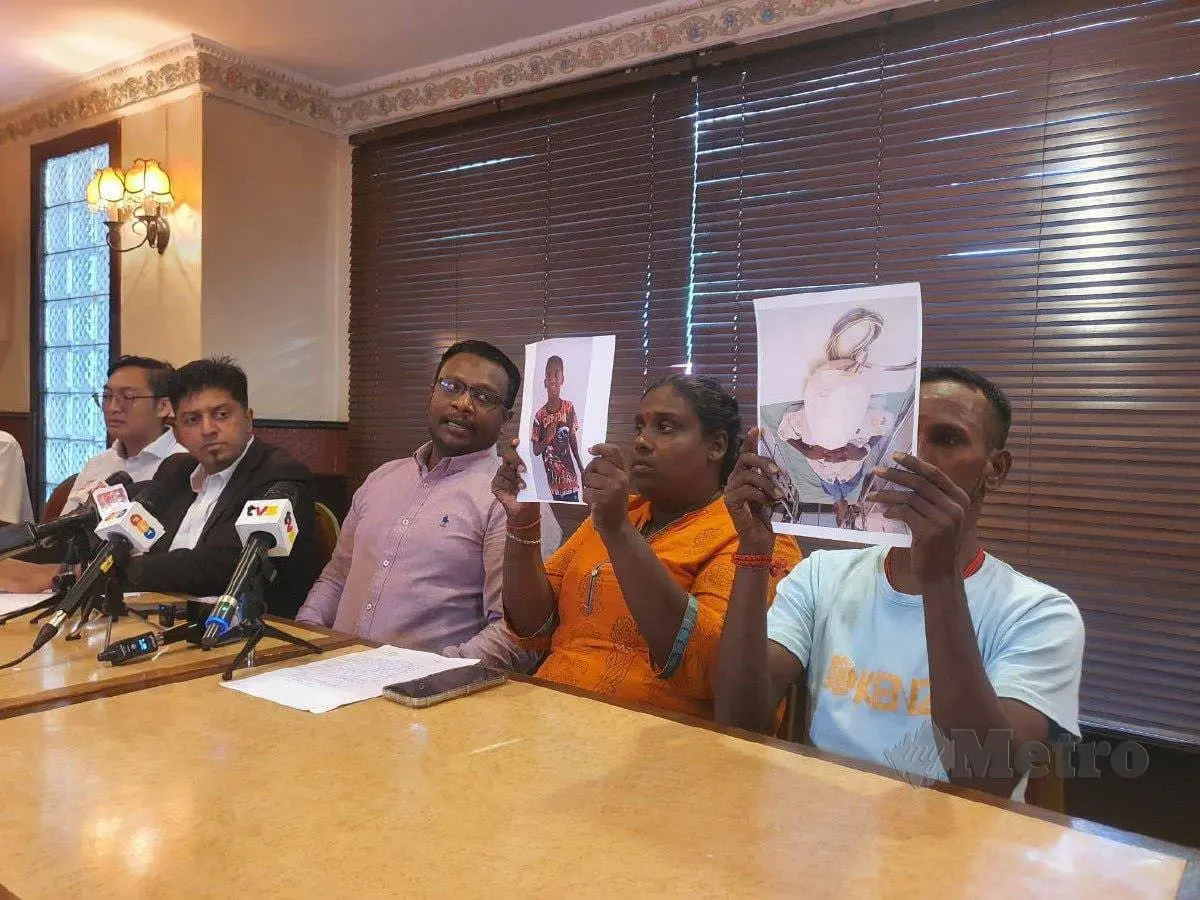 A.D. Mogahana Selvi (second, right) and her husband B. Suresh (right); with Malaysia-Singapore Workers Task Force chairman S. Dayalan and lawyer Dinesh Muthal (second, left) speaking to the media. The couple’s son is now left disabled after suffering a heatstroke.