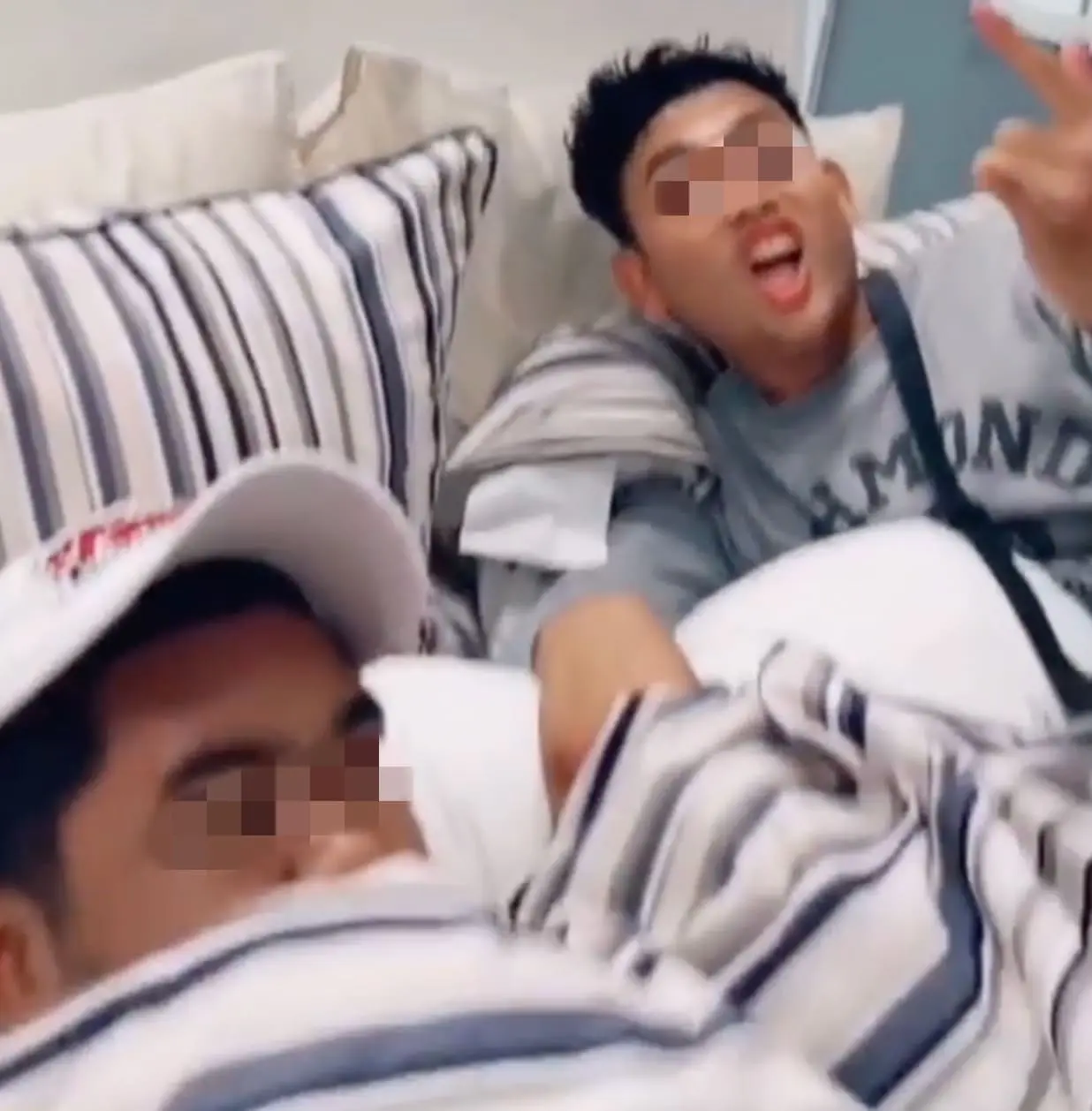 2 maskless men allegedly caught sleeping on a bed in IKEA Penang.JPG