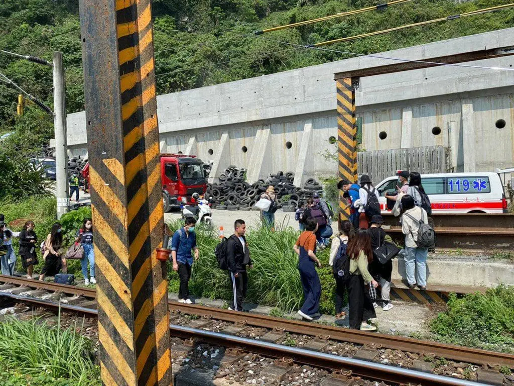 Taiwan train crashes into truck and derails, kills 36 and injures many