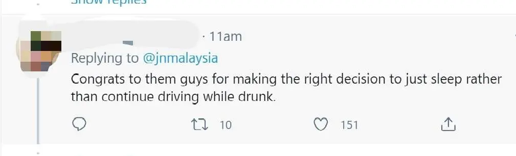 Two men believed to be drunk obstruct traffic while passed out cold in the car