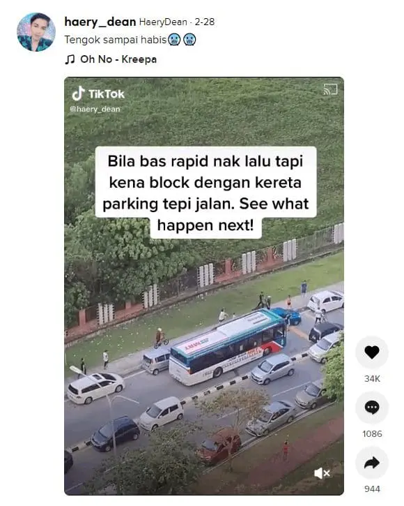 Malaysians unite to move an illegally parked car off the road