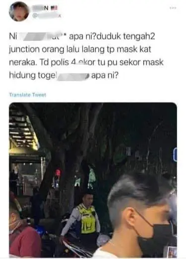 Traffic cop lodges report against netizen who accused him of not wearing a mask