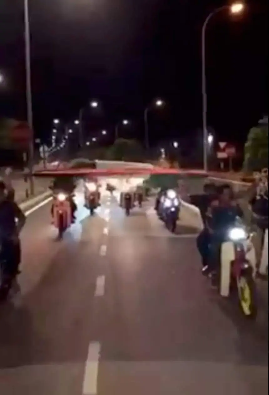 Motorcyclists detained for reckless driving while displaying the Palestinian flag