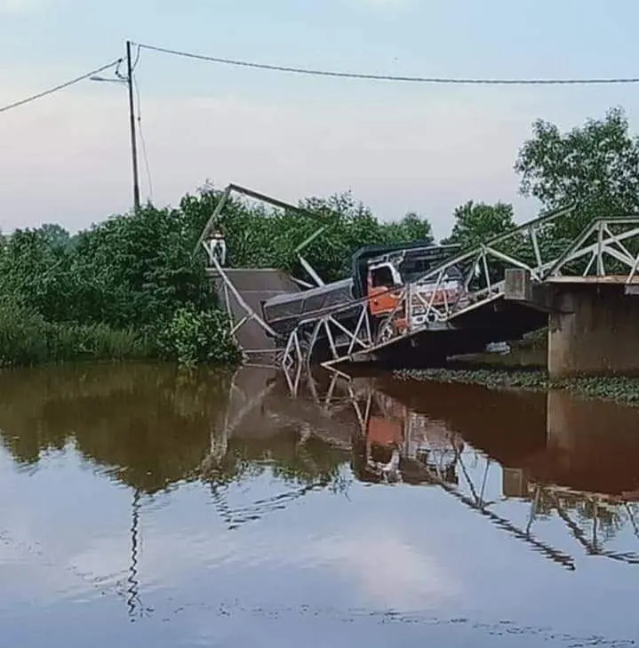 Bridge used as a rat lane collapses after a truck attempts to cross over it