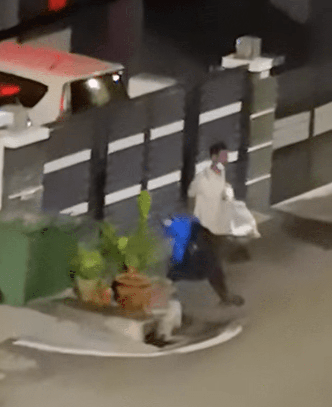 Desperate times: Man scavenges for food from rubbish bin at 3am