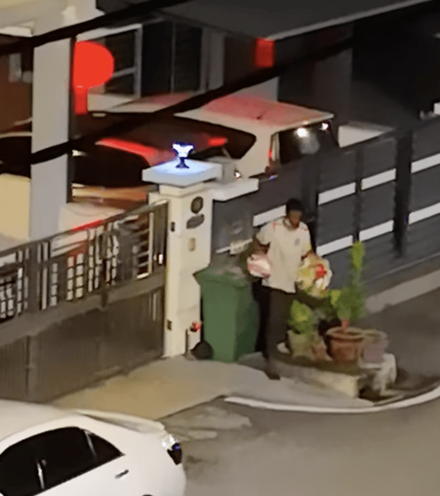 Desperate times: Man scavenges for food from rubbish bin at 3am