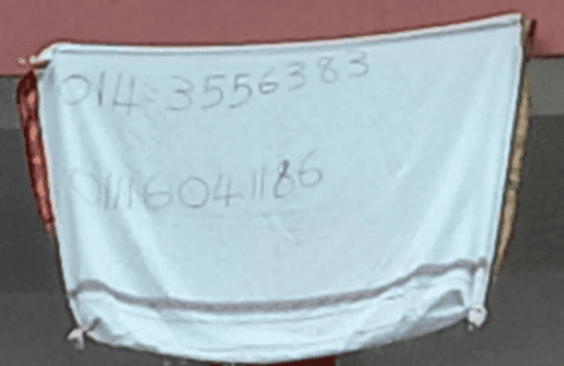 Residents hang white bedsheets and clothes instead of flags to avoid police action