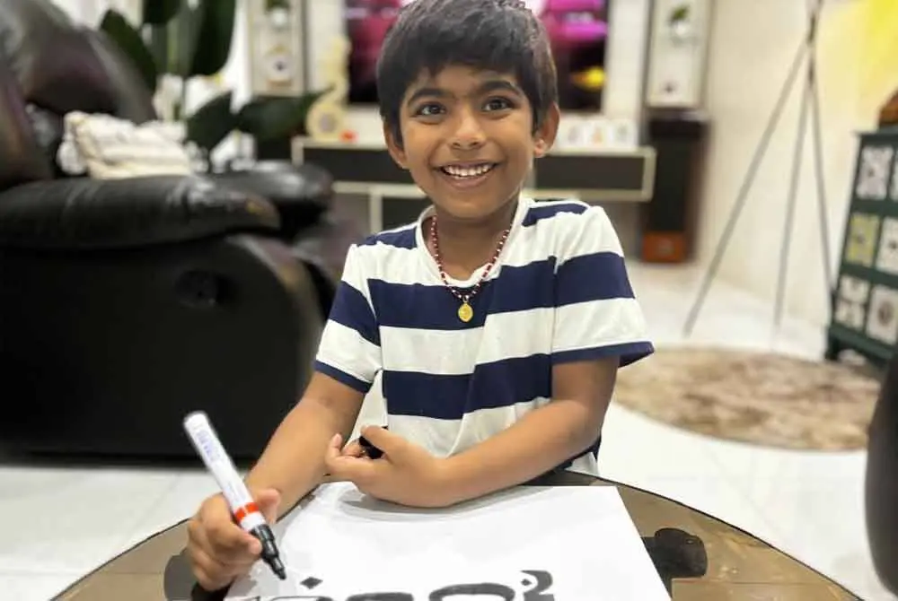 M Chatriyan writing in jawi 