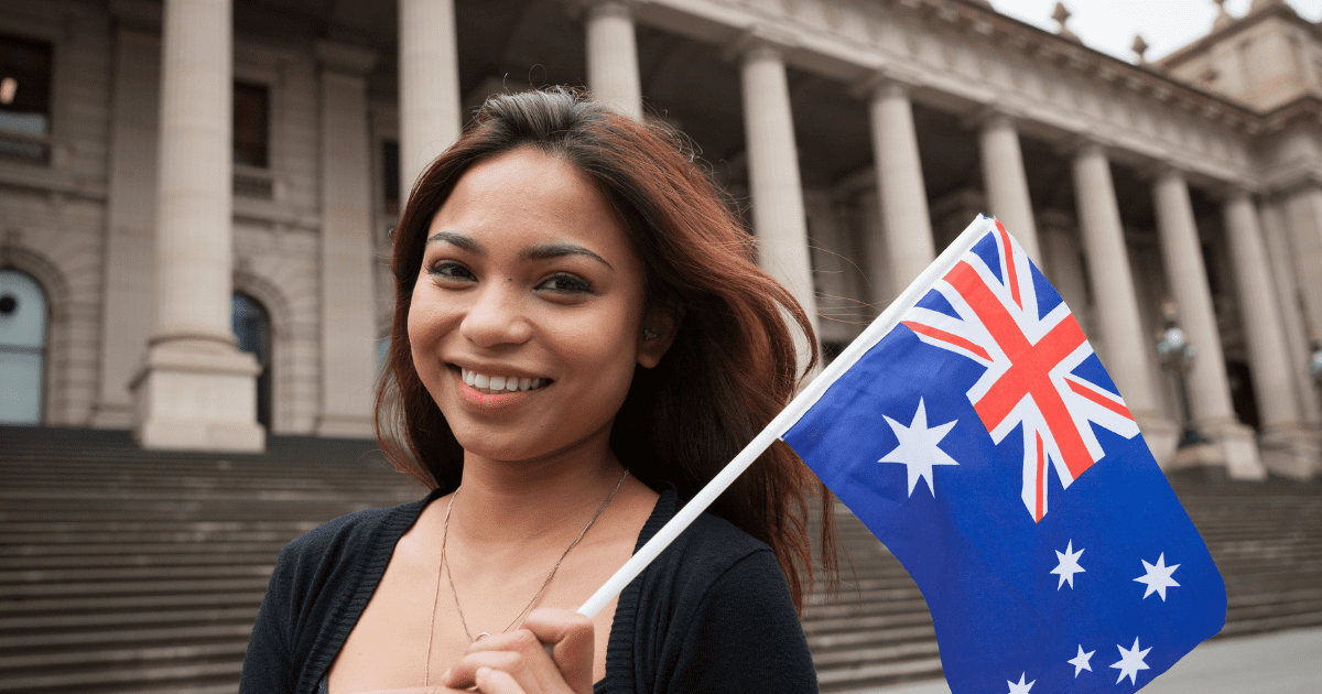 Australian woman holding Australian flag