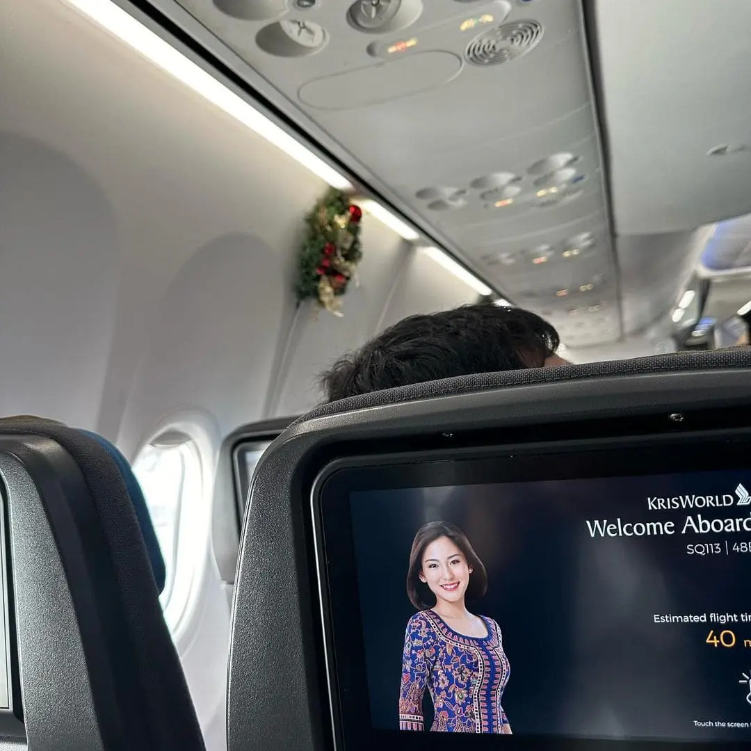 Tony Fernandes inside the Singapore Airlines flight