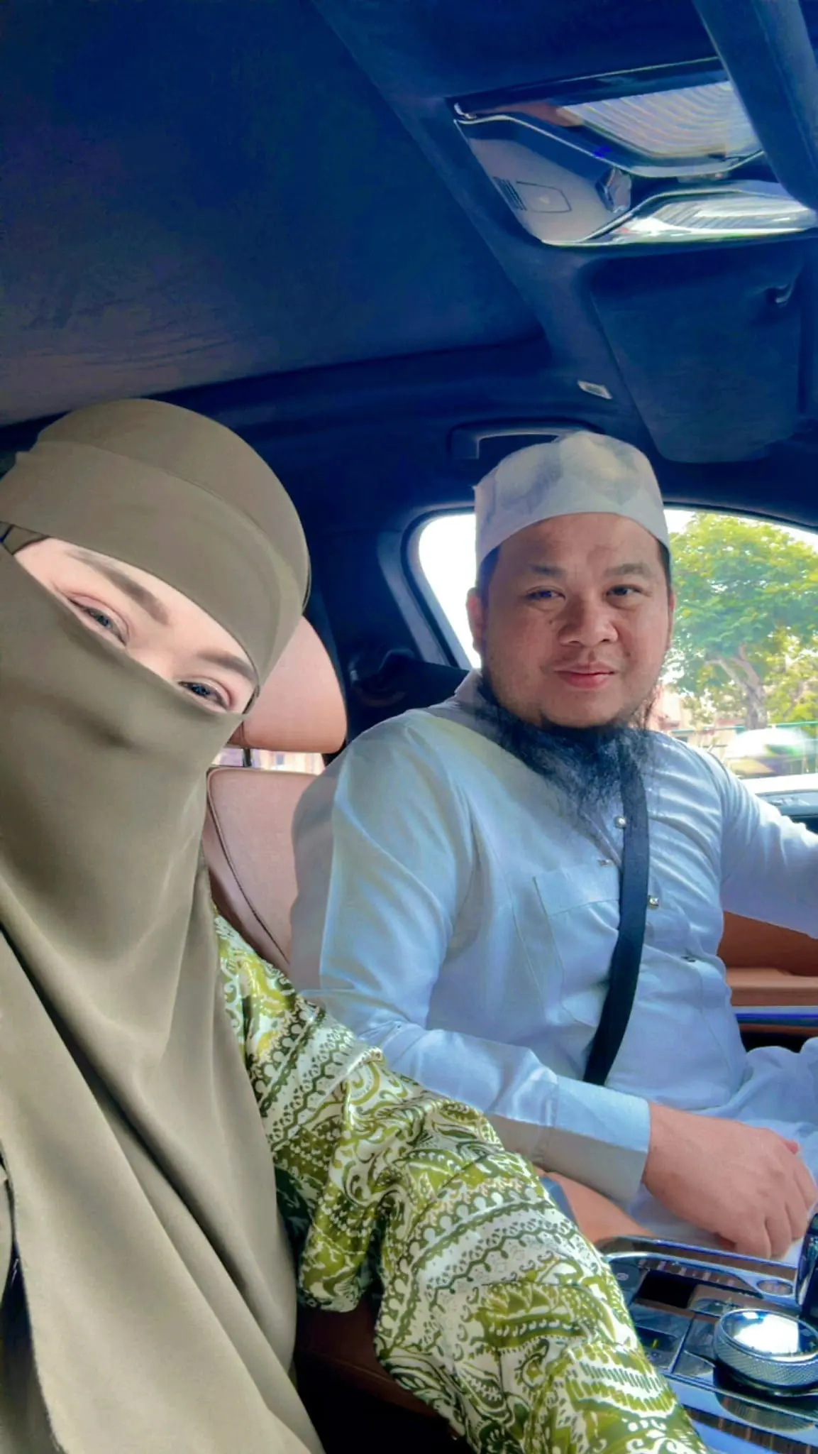 Ebit Lew and his wife