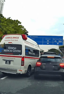 Ambulance and Mercedes collide