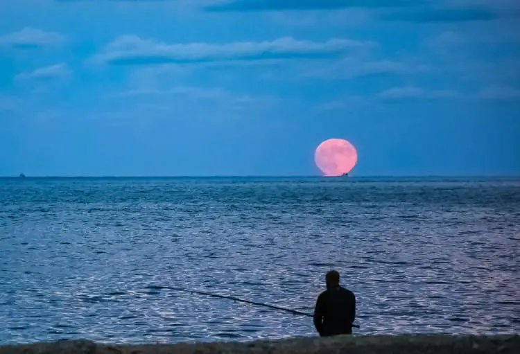 Man fishing by the sea