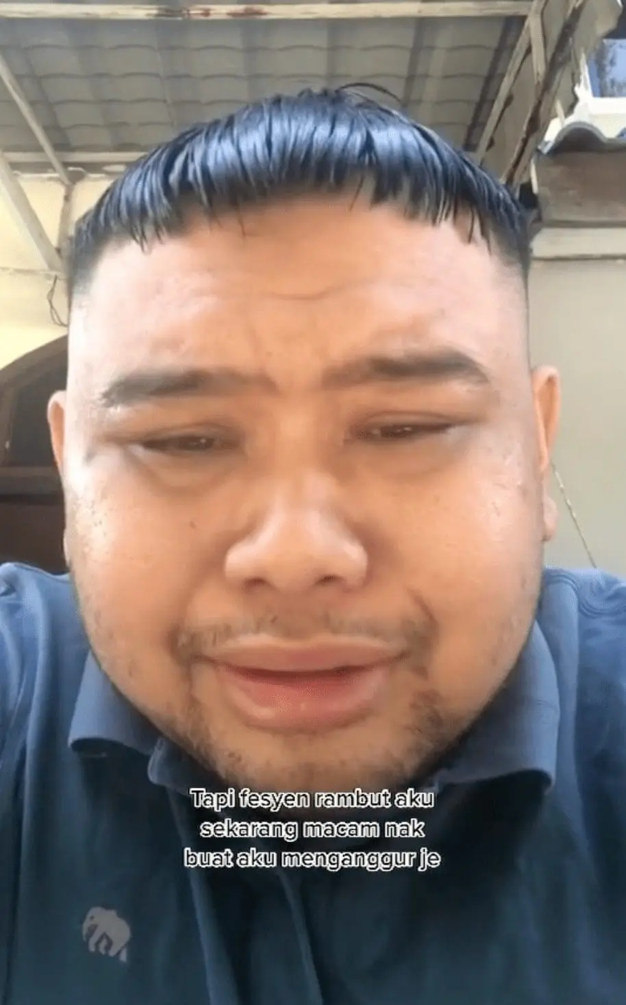 Malaysian Kim Jung Un cuts his hair before interview 3.png