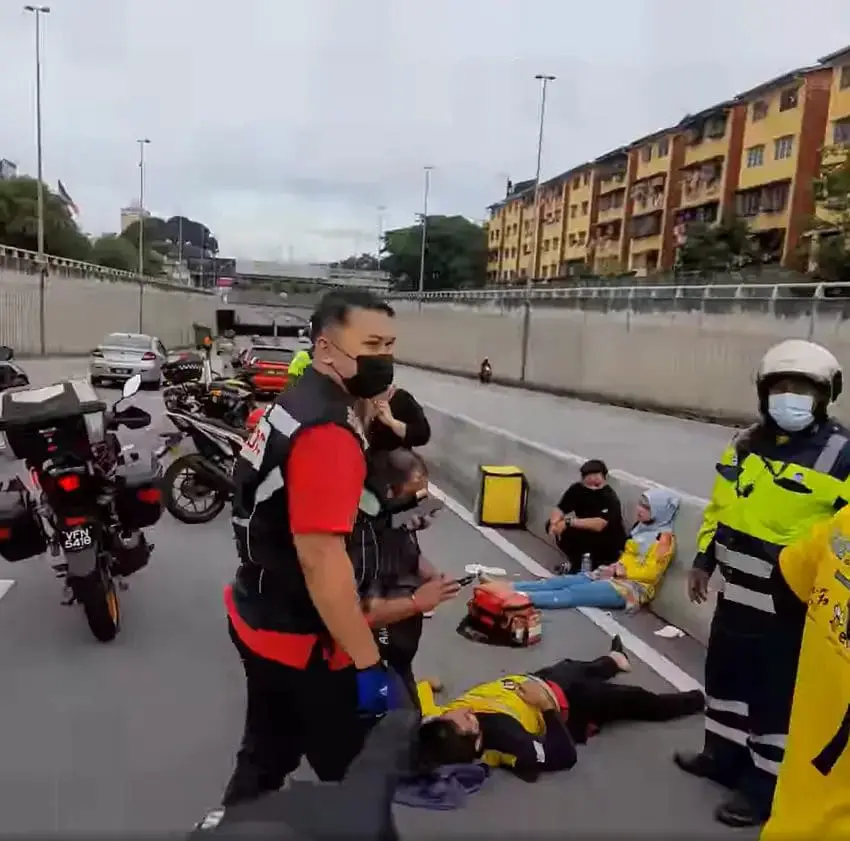 Two delivery riders injured in hit-and-run, driver still at large