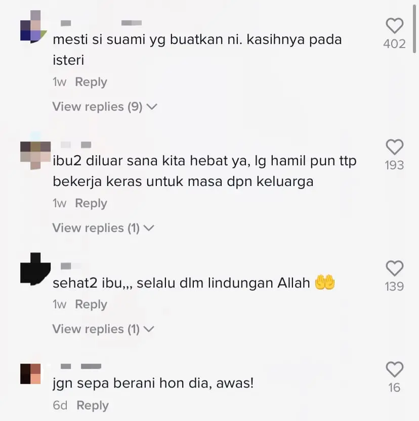 'Sorry, I drive slow as I'm pregnant' M'sian cyclist puts up sign on her back while riding a motorcycle