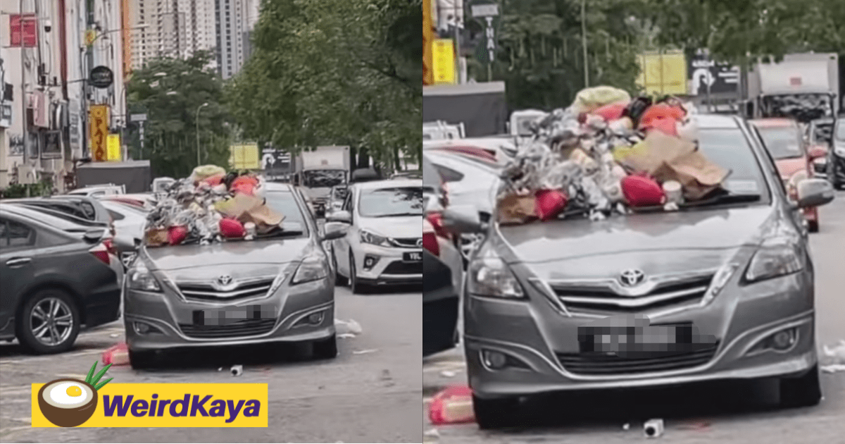Double-parked Toyota Vios gets decorated with heaps of rubbish in return