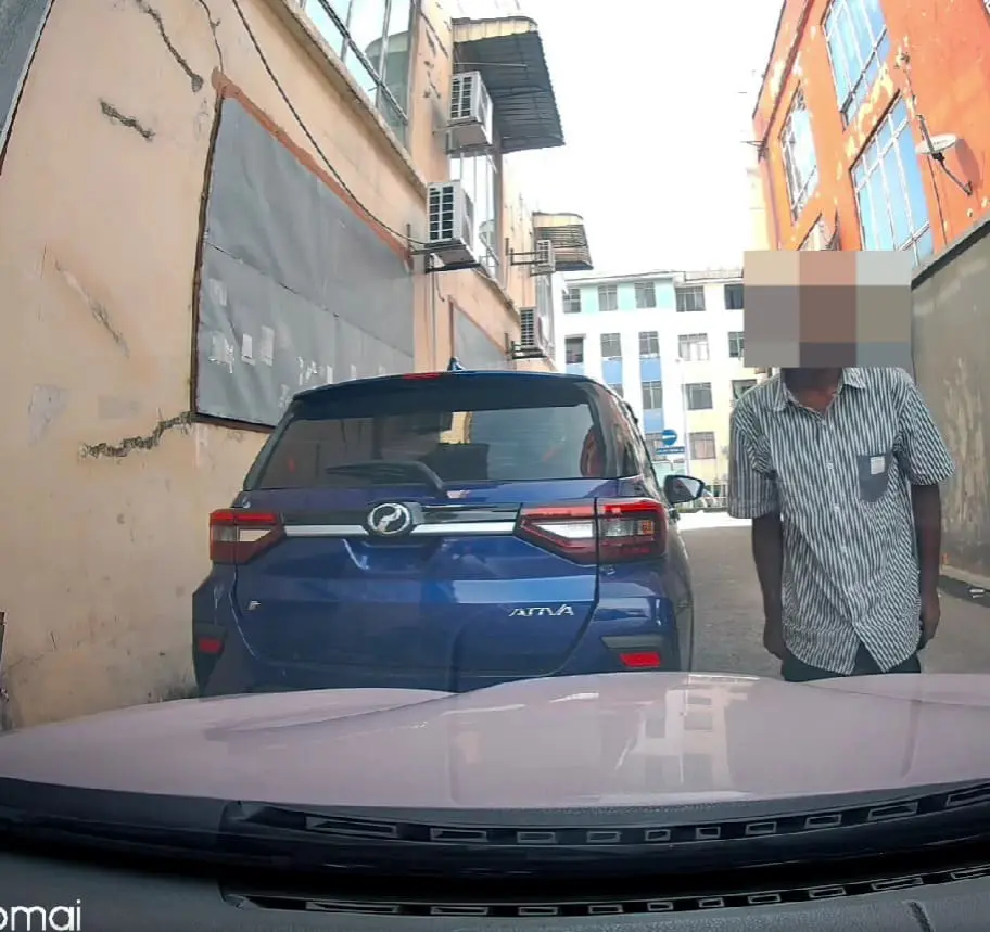 a man pulling down his pant