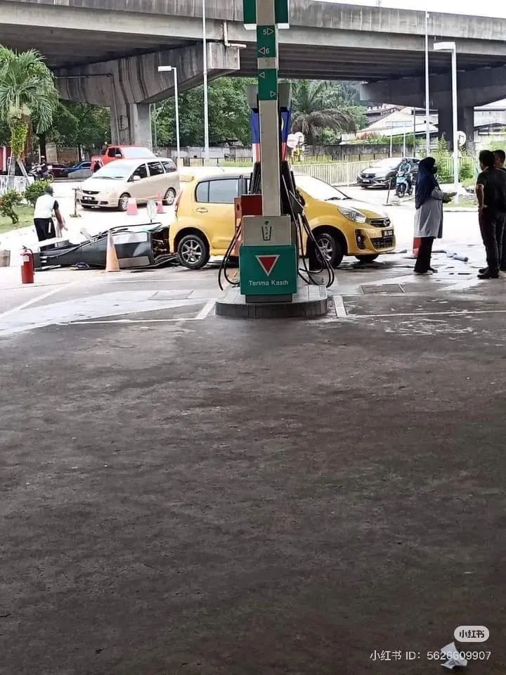 Aftermath of Myvi crashing into petrol pump