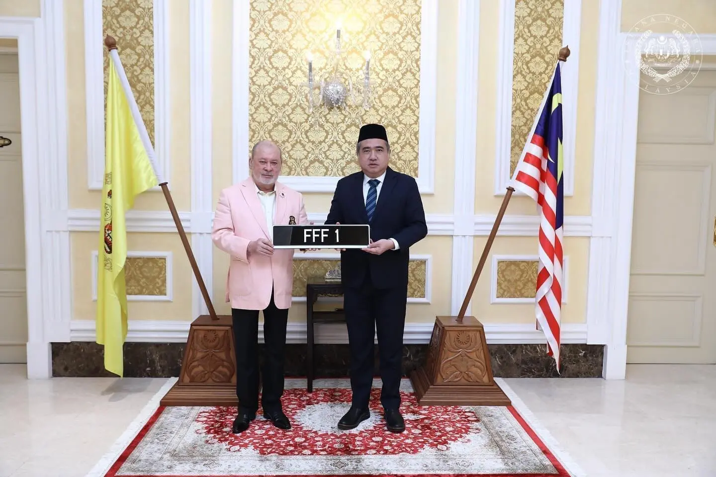 Agong receiving his FFF 1 number plate