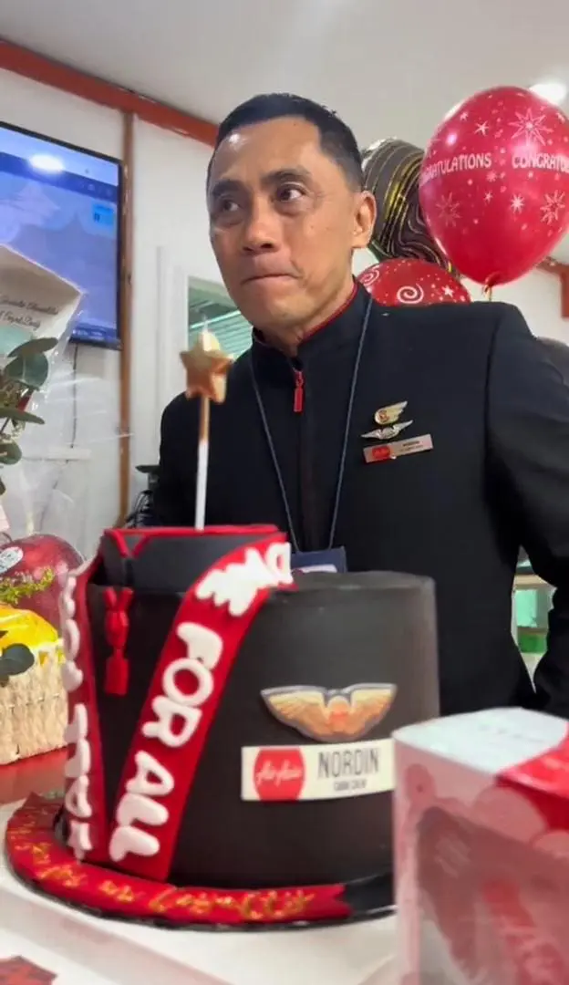 AirAsia cabin crew celebrating his farewell