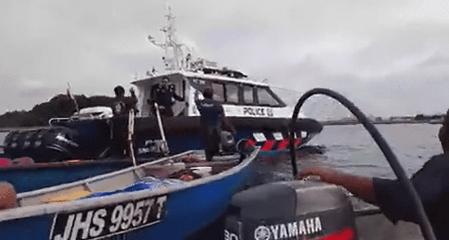 Johor fishermen arguing with SG coast guard