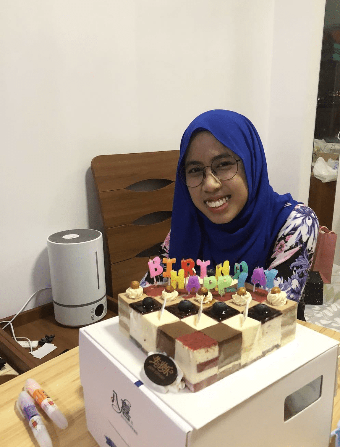 Aqilah Celebrating her birthday in China