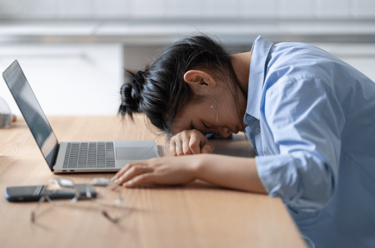 Asian woman exhausted from work