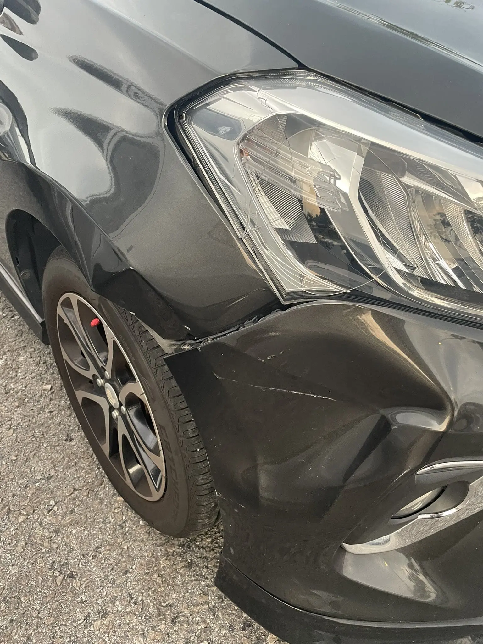 Axia dented bumper