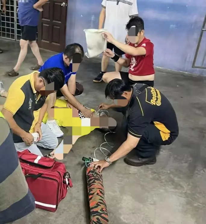 badminton man collapse