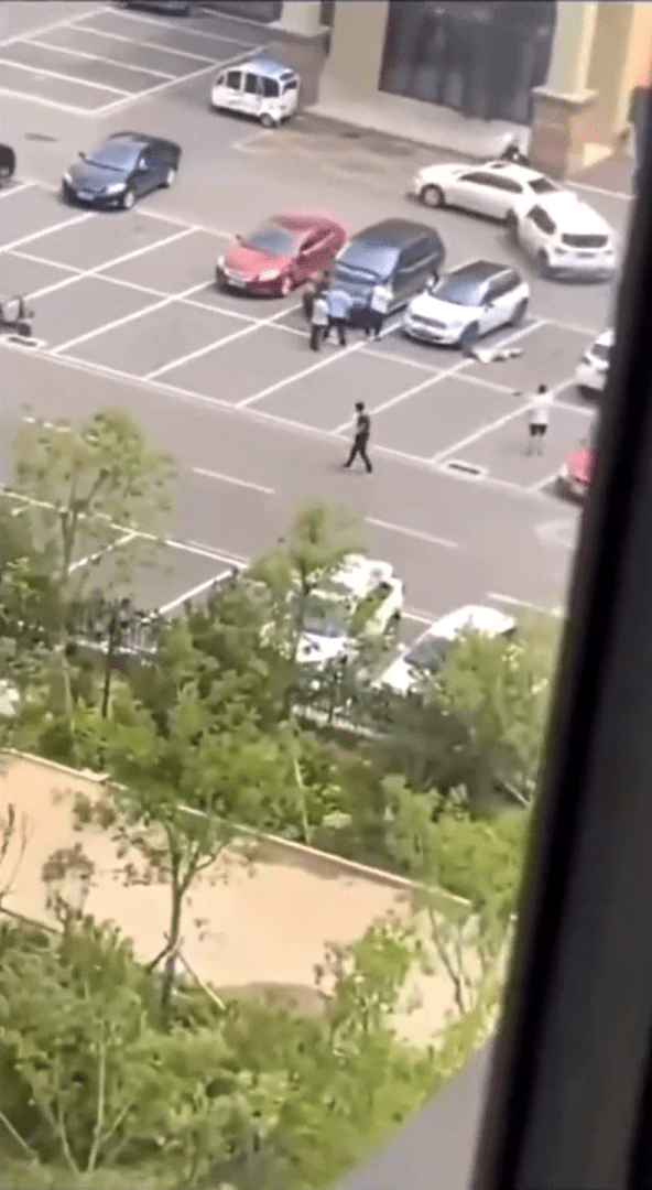 China woman run over by Jeep