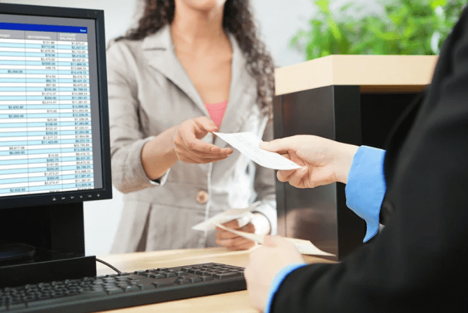 Woman making a transaction at the bank