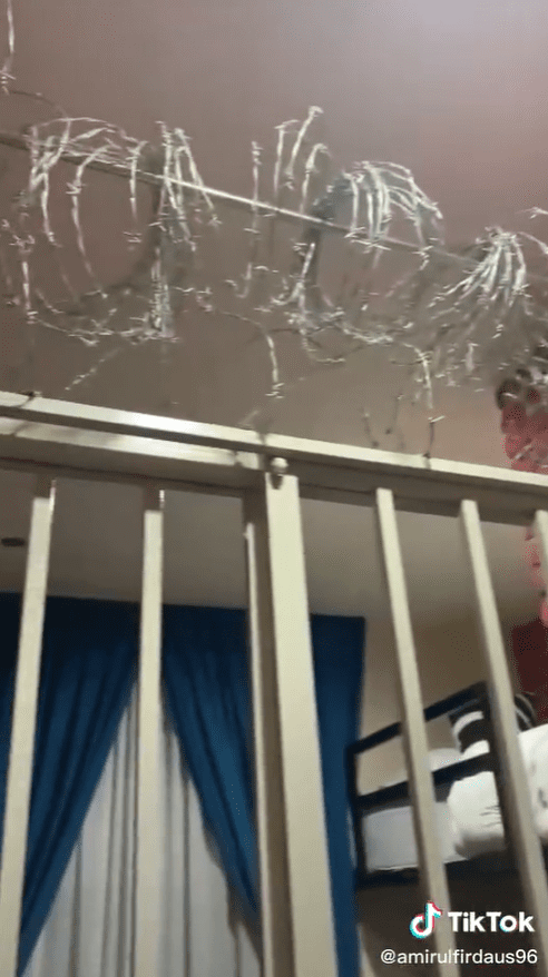 Prison-themed room at Impi Yan Hotel