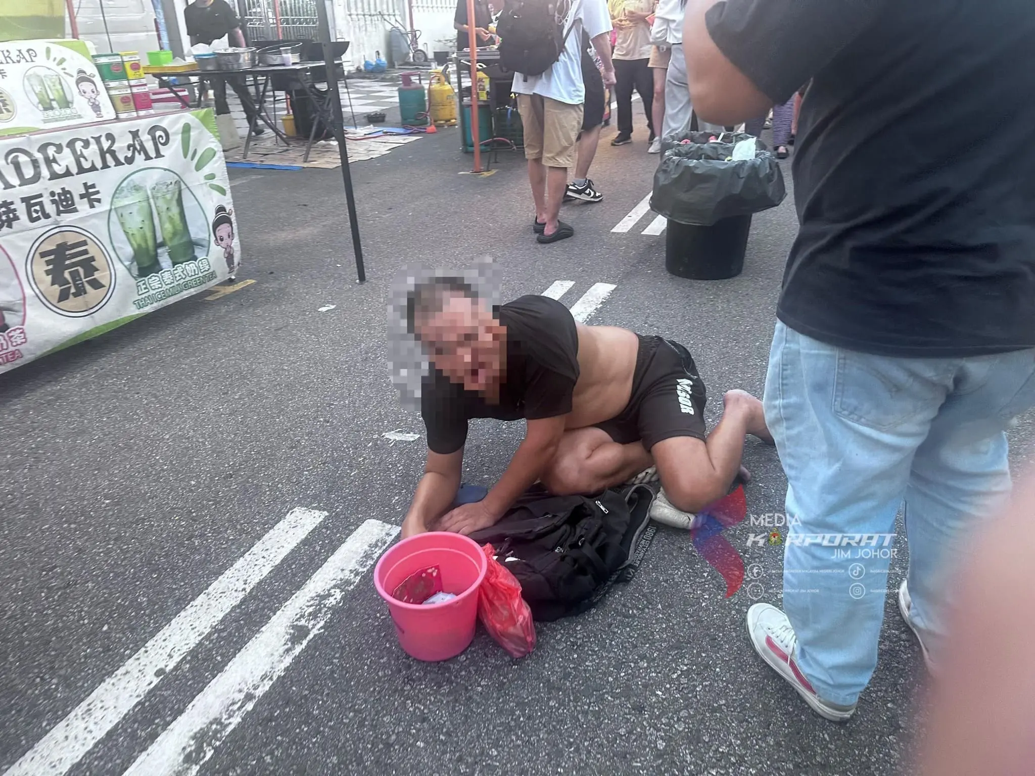 Beggar at Johor night market 1