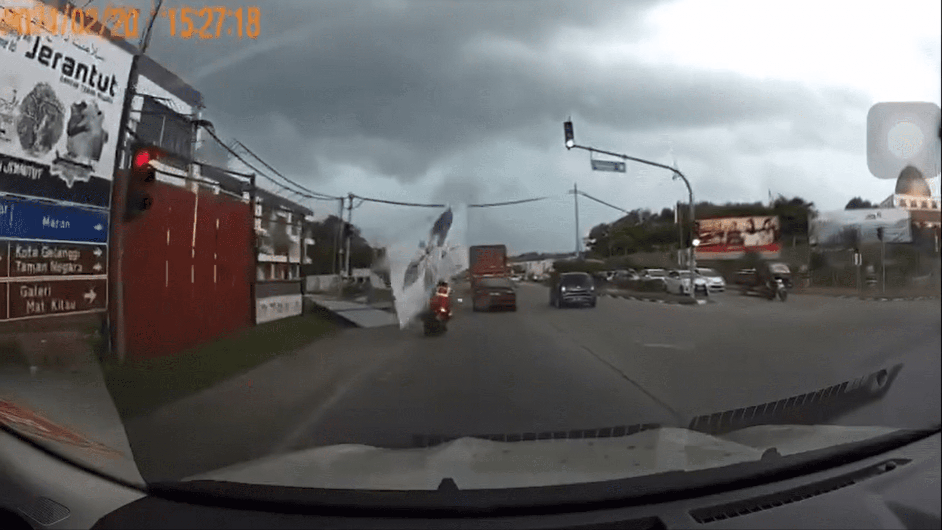 Billboard flies towards M'sian woman