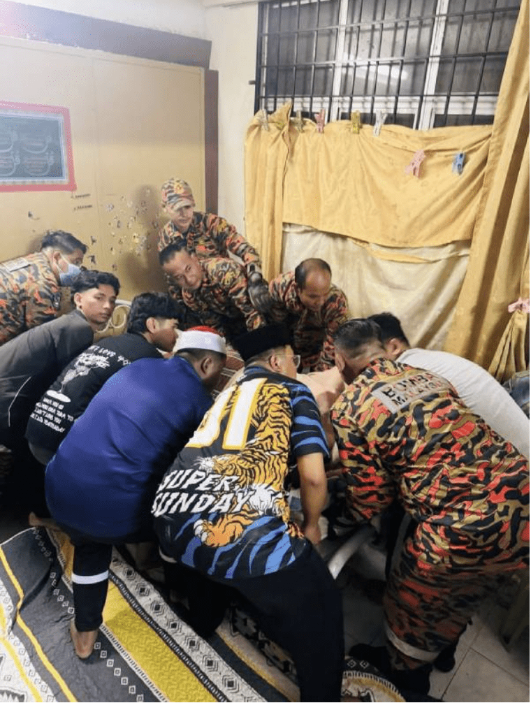 Bomba removing body of dead teen weighing over 200kg from dorm