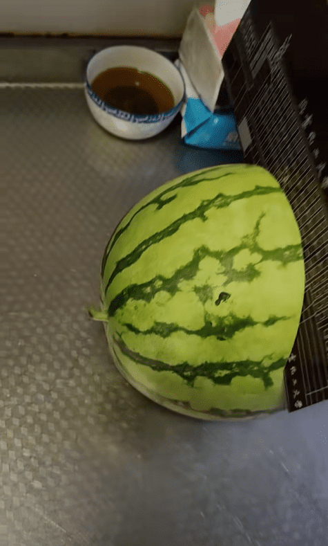 BUTC student uses admission letter to cut watermelon