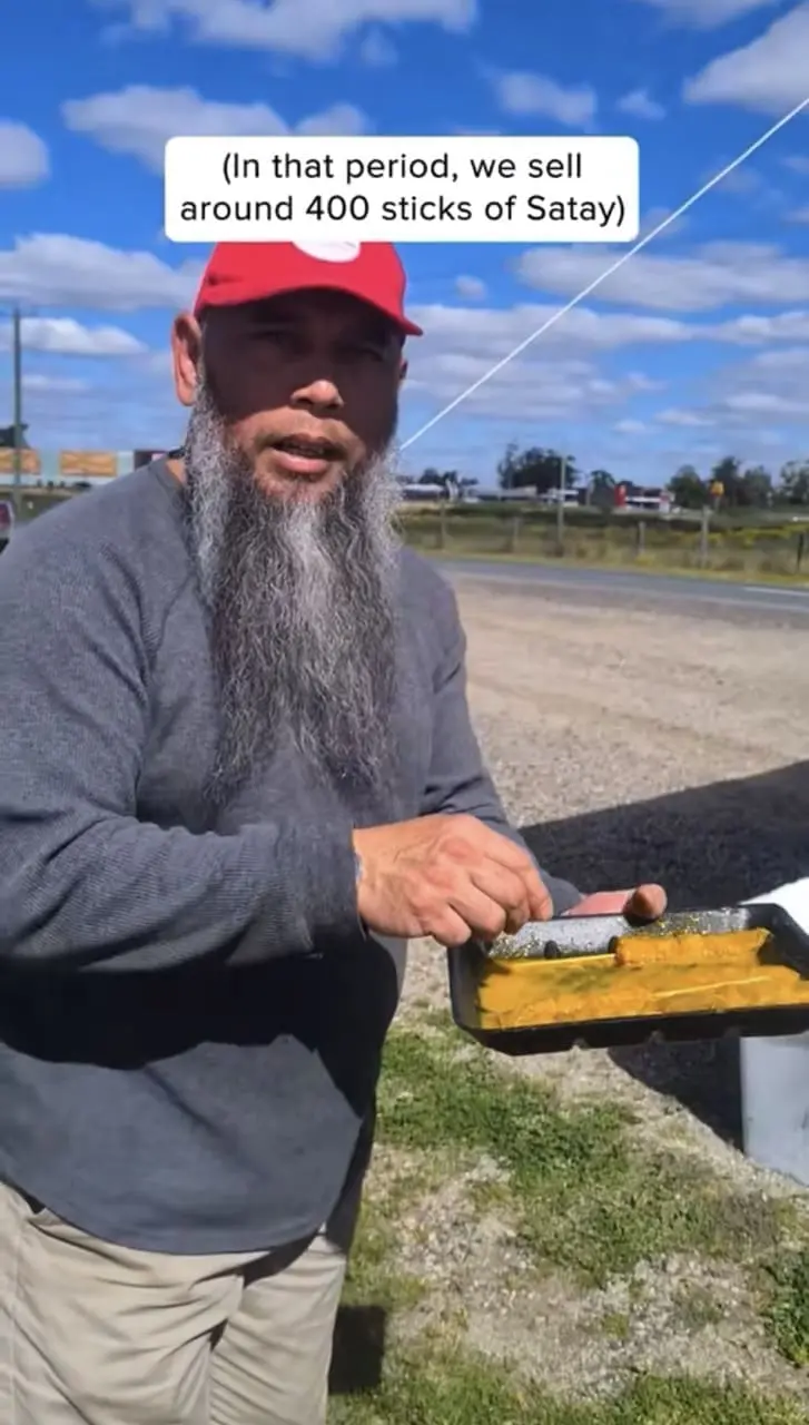 Malaysian man selling satay in Australia