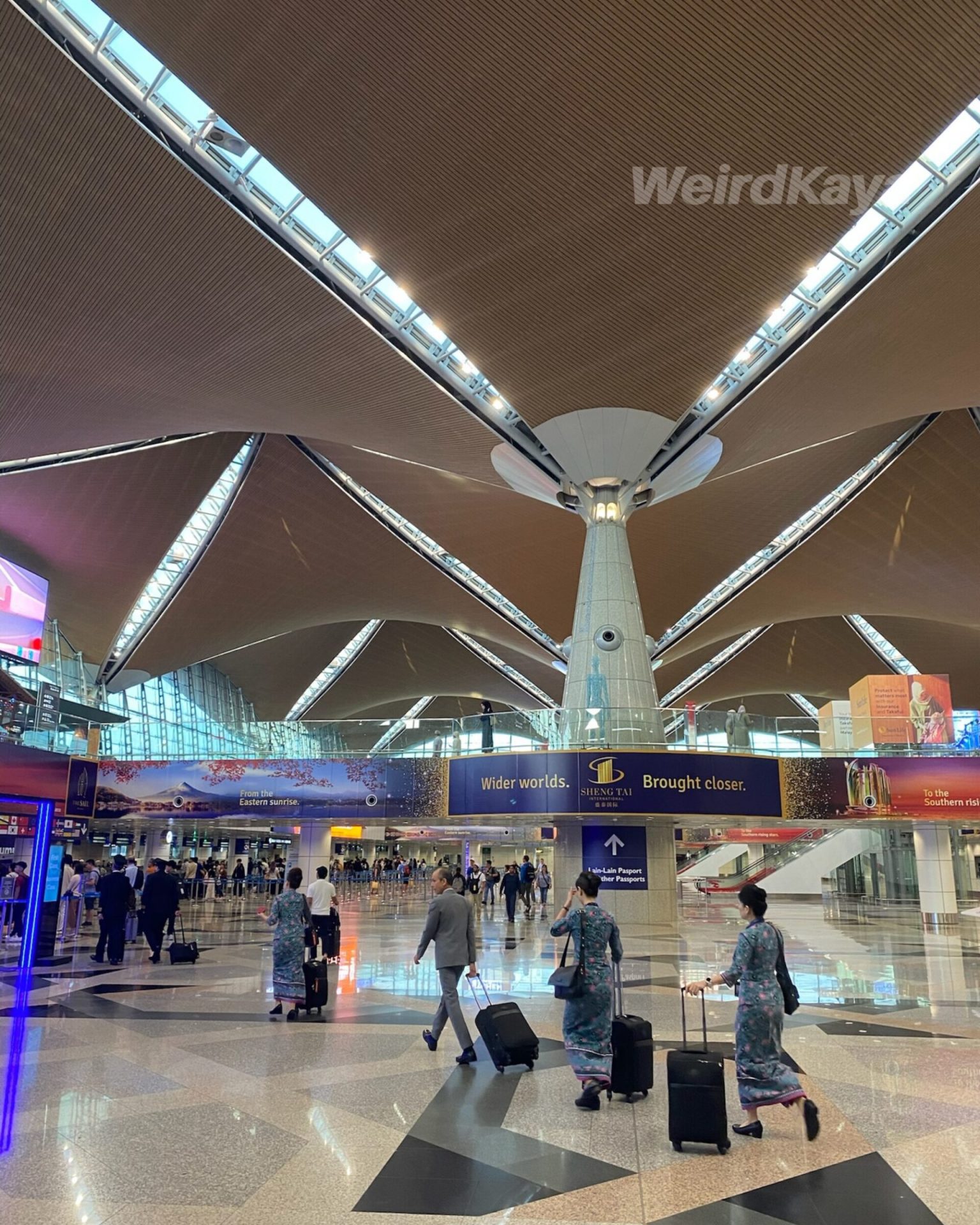 Cabin crew at KLIA airport lobby departures