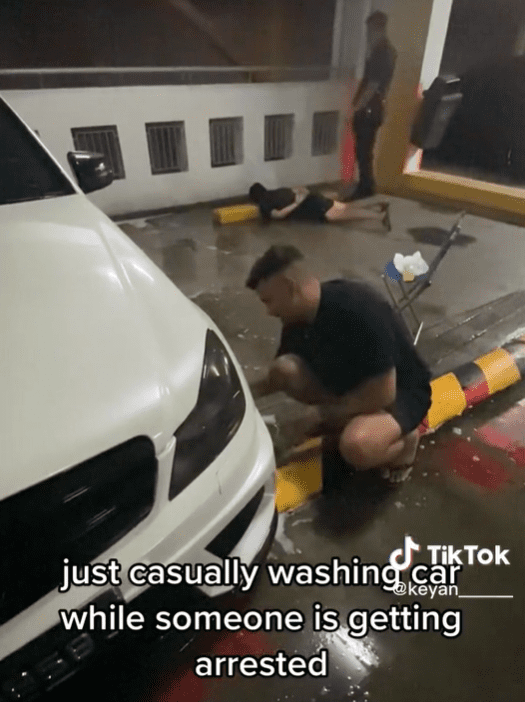 SG Man Continues To Wash Car Calmly As Another Man Gets Arrested At Car Park