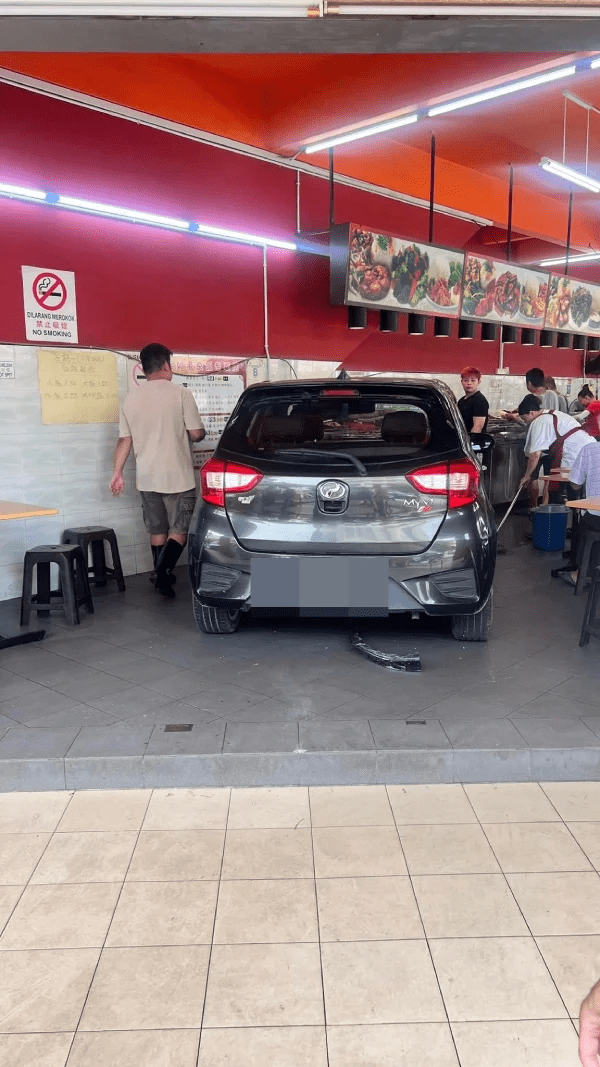 Car crashes into economy rice stall in Ipoh