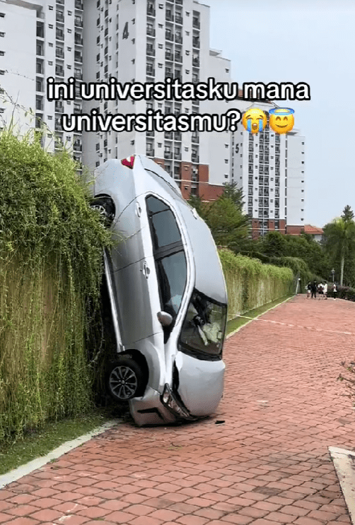 car fallen upside down at a university