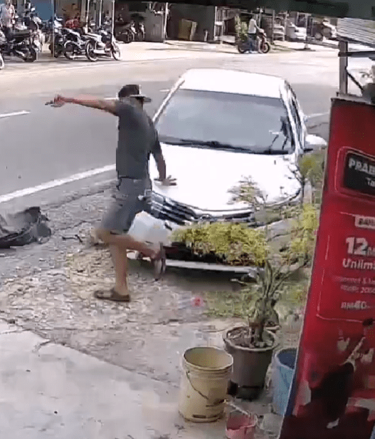 car u-turn to hit man