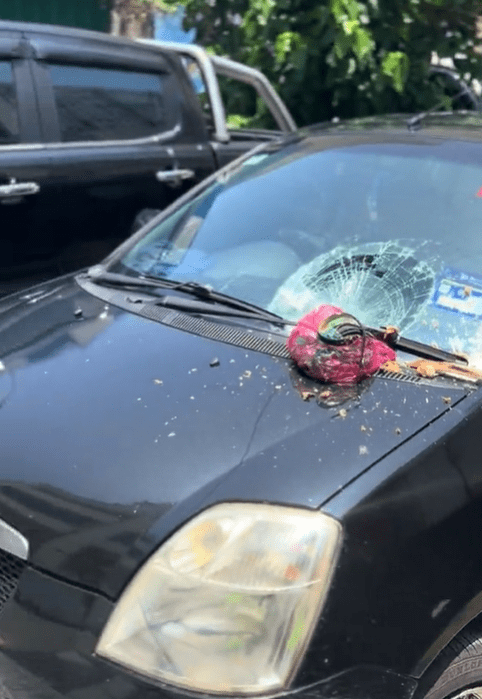car windscreen damaged by rubbish