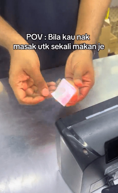 cashier is scanning an onion