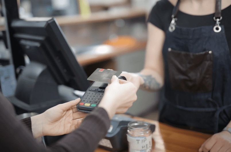 Cashier serving a customer