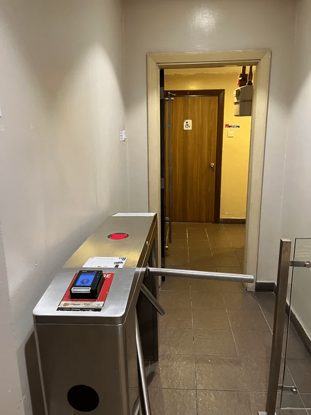 A turnstile at a cashless pay toilet in Solaris Mont Kiara