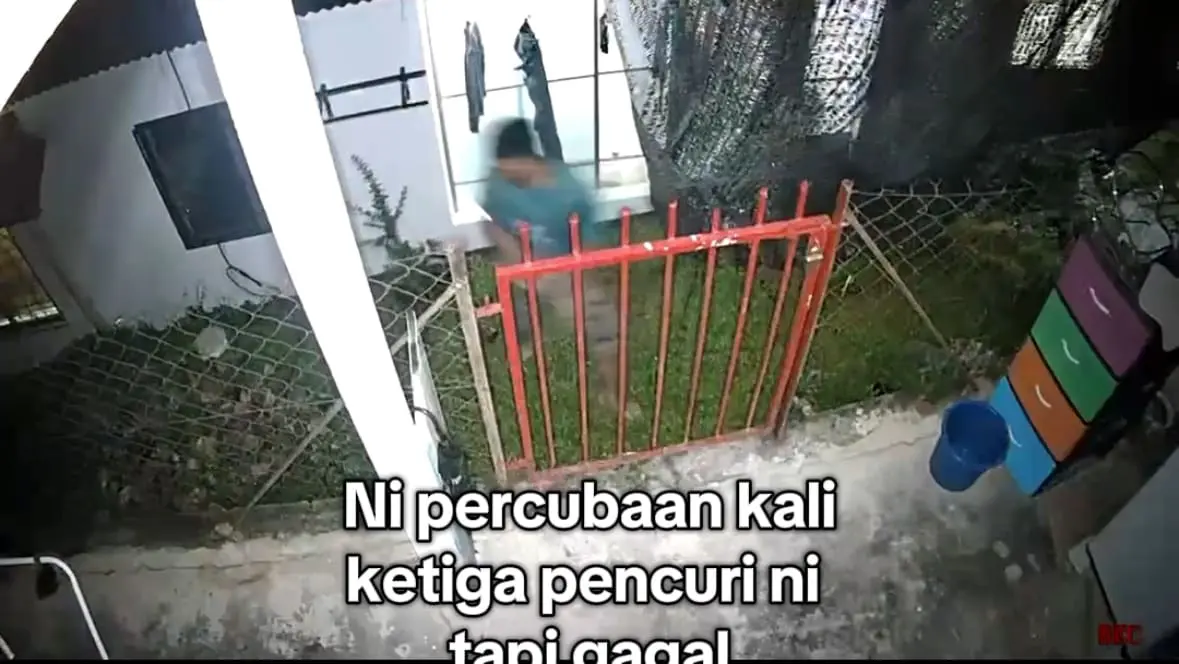 CCTV Captures Intruder Sneaking Into Home Before Motion Light Scares Him Off